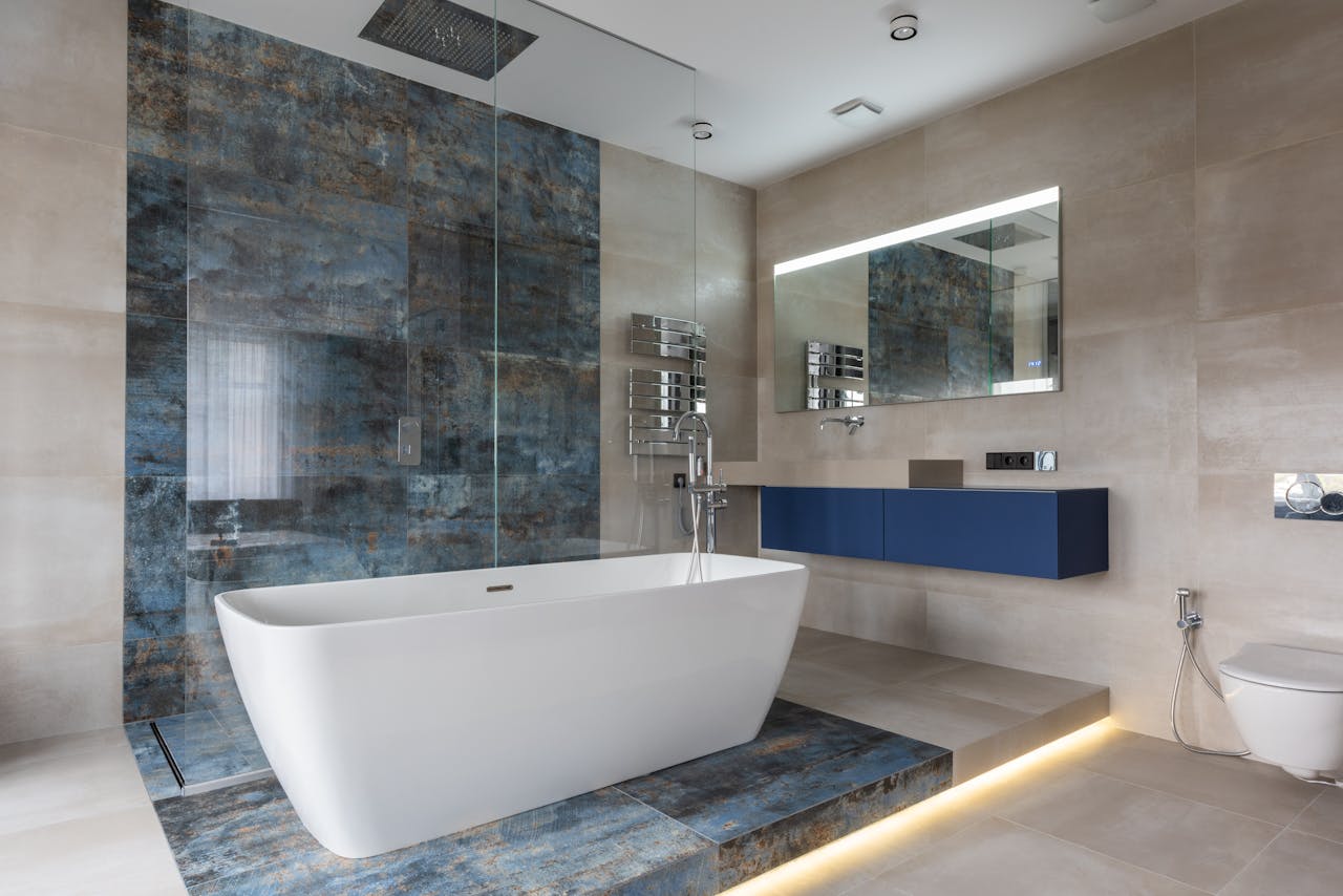 Elegant bathroom featuring a sleek freestanding bathtub and contemporary design elements.
